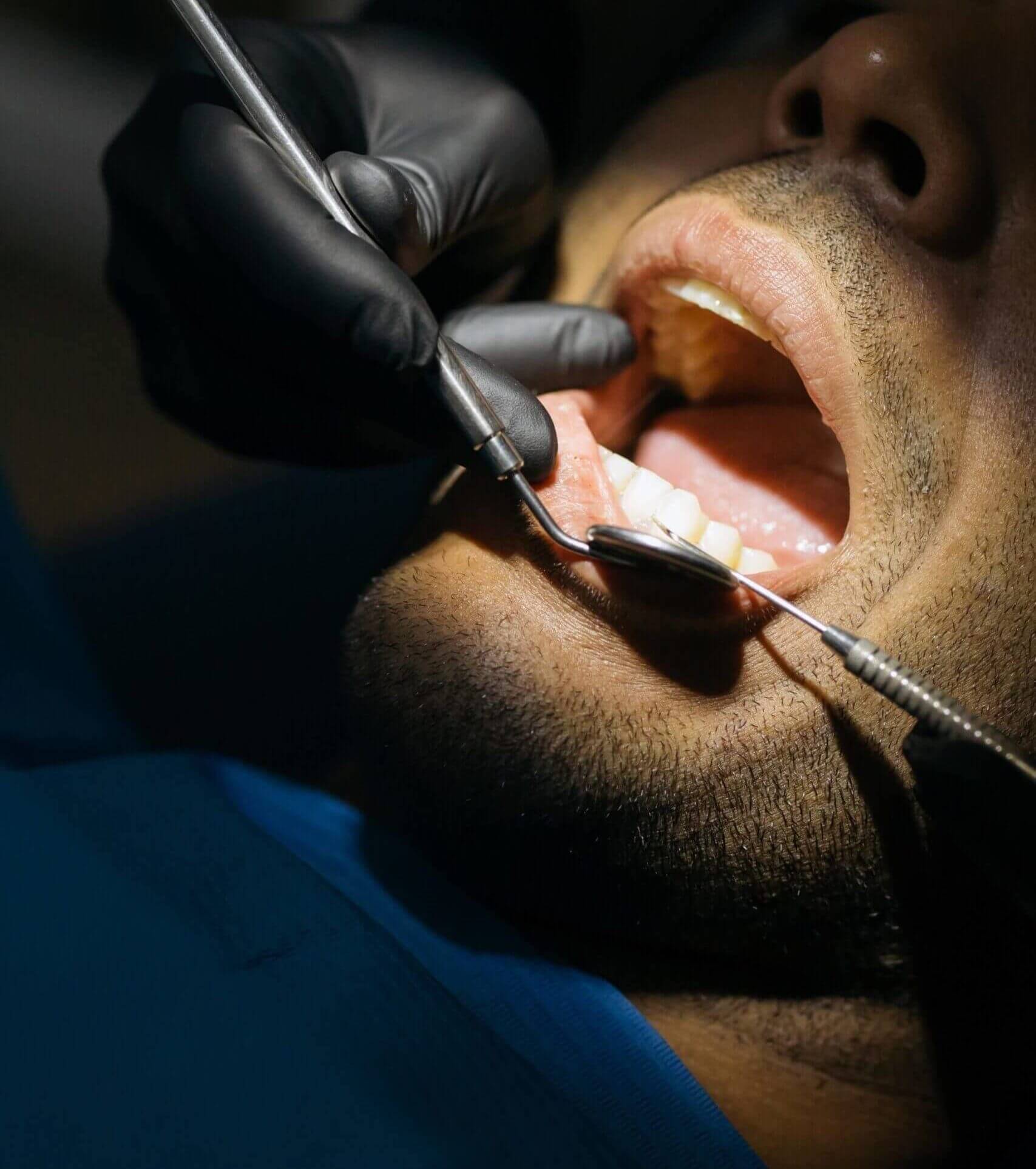 dentist in Desoto, TX, treating patient