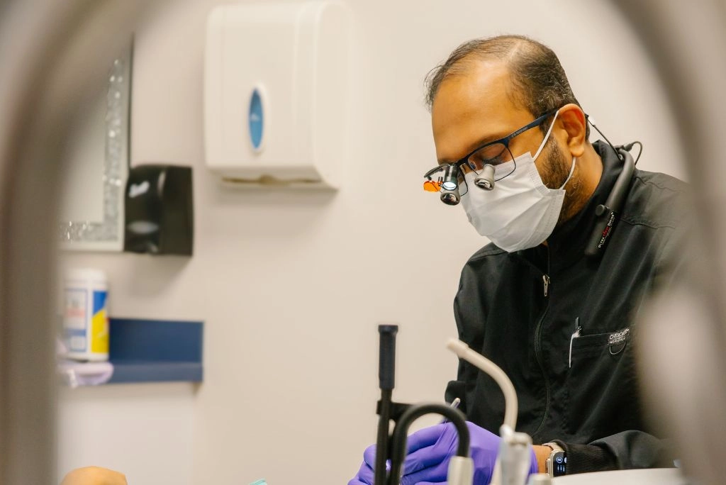Dr Varkey examining a patient